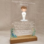 pamiątka pierwszej komunii świetej dla chłopca chłopiec w albie.jpg