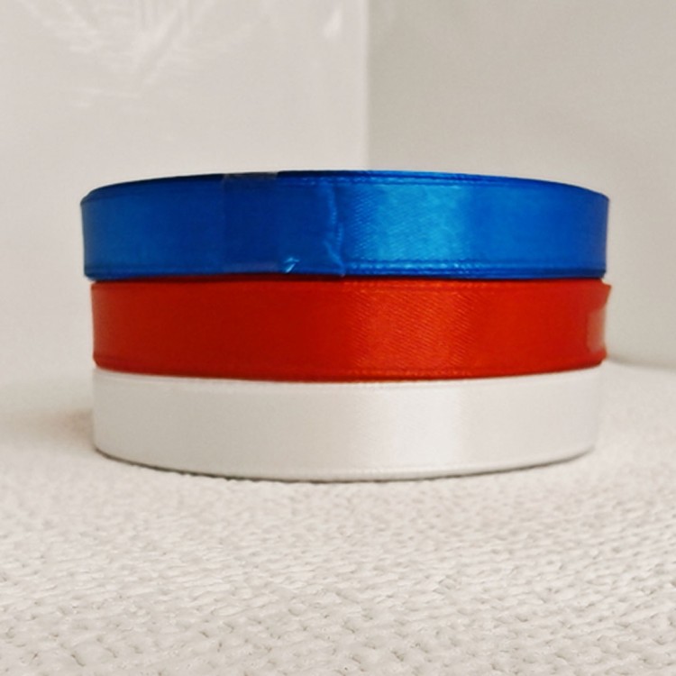 Pamiątka Komunii Świętej świeczka_wstążka.jpg